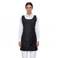 Black Waterproof Chemsafe Apron with side pockets for hair colouring and beauty treatments