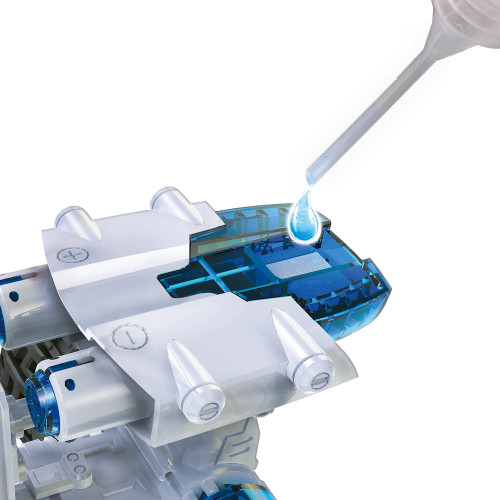 Close-up of the Salt Water Fuel Cell Engine, with a pipette adding a water droplet to the blue fuel compartment.