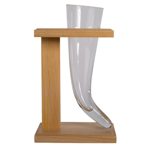 A Viking beer horn glass rests upright in a simple, light-coloured wooden stand against a white background.