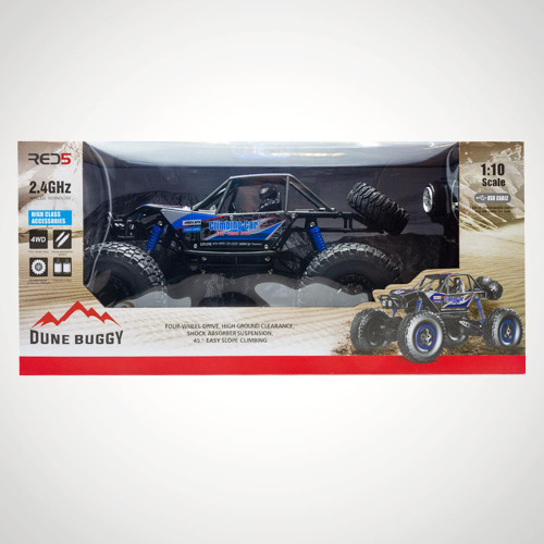 The blue and black RED5 Remote Control Dune Buggy displayed inside its retail box, showing its 1:10 scale and 4 wheel drive.