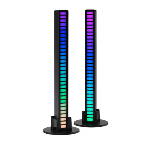 Two sound reactive light bars stand vertically, displaying a vibrant colour gradient.