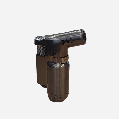 The handheld Whiskey Smoker torch in a metal grey finish. It has a short, angled nozzle and textured ignition button.