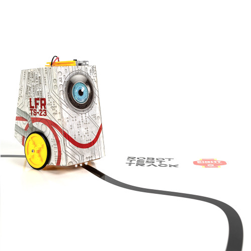 A small, boxy robot with a circuit board design and a large blue eye follows a black line on a white test track.