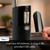 A person uses the battery compartment on a black countertop draft beer dispenser. The text below details step two about battery and USB operation.