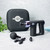 A black Wellbeing Mini Massage Gun with three interchangeable heads, displayed in front of its branded black carry case.