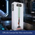 The Luke Skywalker Lightsaber Desk Lamp packaging sits on a desk inside a spaceship, showing how it is officially licensed.