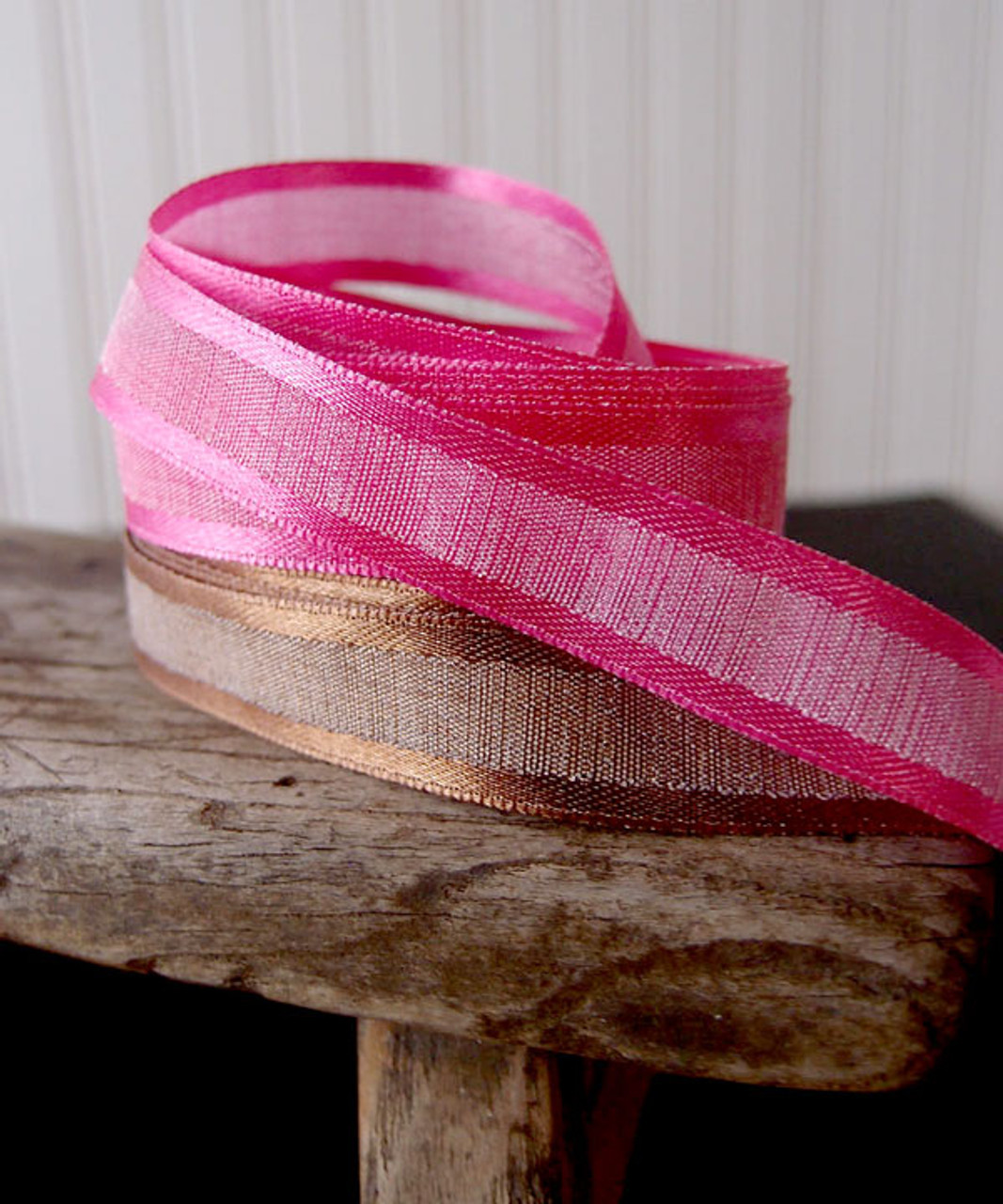 Hot Pink Faux Linen Ribbon with Satin Edge. This is an elegant fuchsia ribbon that florists and designers need to have in their styling kit. Available in three sizes.