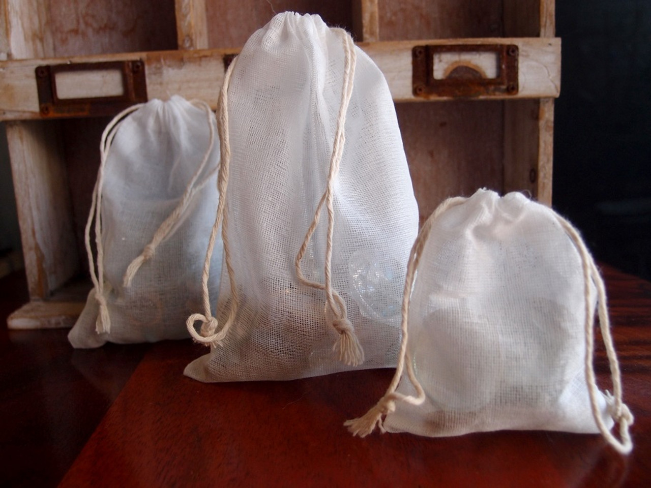 Wholesale Muslin Bags, Wholesale See-Through Cotton Drawstring Bags | Packaging Decor