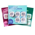 Three stacked sheets of Tile’s Lost and Found Labels