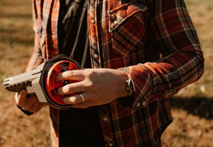 CALDWELL CLAYCOPTER HAND HELD DISK THROWER