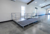 AmTab QUICK-ST48xxC-CHARCT Quick Ship Portable Fixed Height Stage with Carpet Deck
Environmental Image