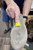 Sanding the surface of the sole to ensure a strong bond for the new sole