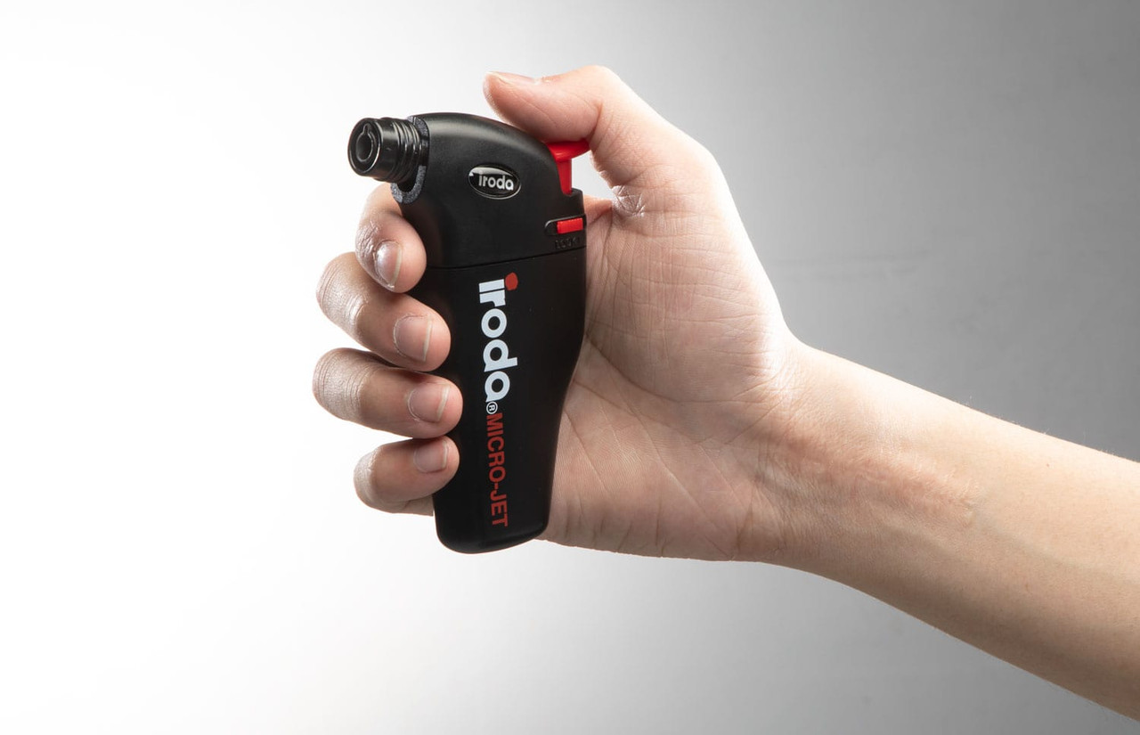 Hand held refillable butane cordless torch and lighter