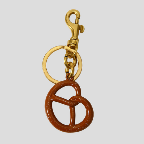 PRETZEL BAG CHARM - BROWN