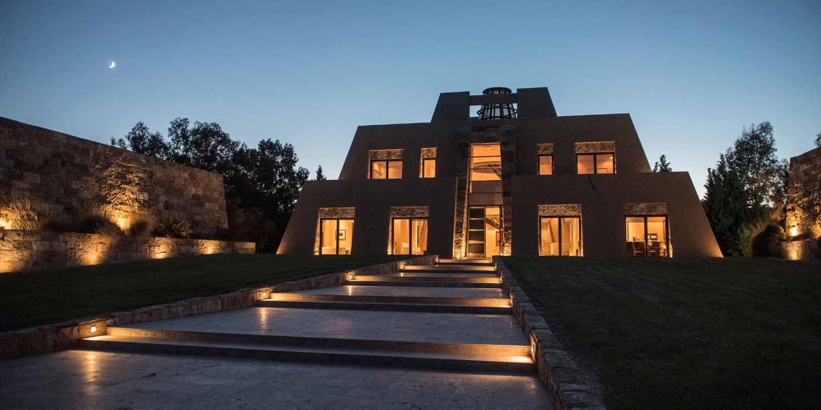 An image of the iconic Catena Zapata winery taken at twilight