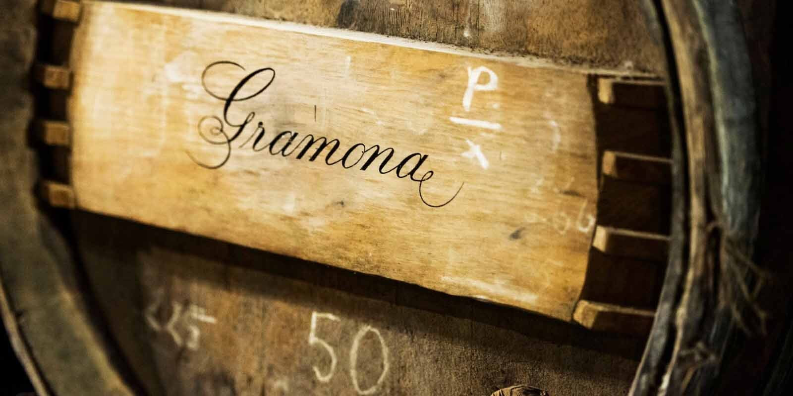 A close-up image of a barrel with an endplate bearing the Gramona logo