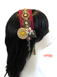 Beautiful Hand made Head piece on a lovely base. It has long ties to secure  it on the head. It is approximately 12" long not including ties.

We can make you a custom head piece in your choice of color and embellishments. Just message us. 

International shipping will be extra. Message us if you are an international customer.
