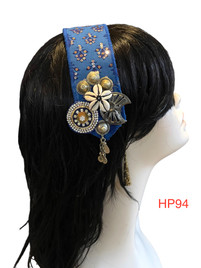 Beautiful Hand made Head piece on a lovely base. It has long ties to secure  it on the head. It is approximately 12" long not including ties.

We can make you a custom head piece in your choice of color and embellishments. Just message us. 

International shipping will be extra. Message us if you are an international customer.
