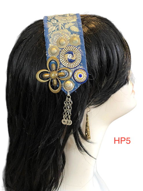 Beautiful Hand made Head piece on a lovely base. It has long ties to secure  it on the head. It is approximately 12" long not including ties.

We can make you a custom head piece in your choice of color and embellishments. Just message us. 

International shipping will be extra. Message us if you are an international customer.
