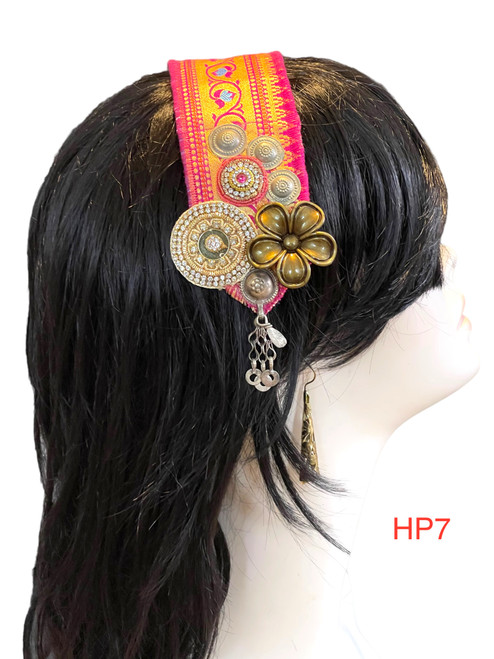 Beautiful Hand made Head piece on a lovely base. It has long ties to secure  it on the head. It is approximately 12" long not including ties.

We can make you a custom head piece in your choice of color and embellishments. Just message us. 

International shipping will be extra. Message us if you are an international customer.
