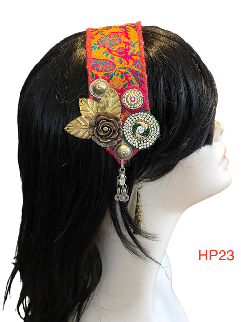 Beautiful Hand made Head piece on a lovely base. It has long ties to secure  it on the head. It is approximately 12" long not including ties.

We can make you a custom head piece in your choice of color and embellishments. Just message us. 

International shipping will be extra. Message us if you are an international customer.

