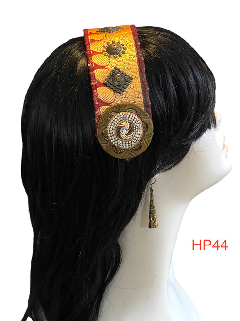 Beautiful Hand made Head piece on a lovely base. It has long ties to secure  it on the head. It is approximately 12" long not including ties.

We can make you a custom head piece in your choice of color and embellishments. Just message us. 

International shipping will be extra. Message us if you are an international customer.
