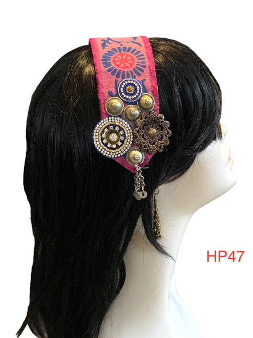 Beautiful Hand made Head piece on a lovely base. It has long ties to secure  it on the head. It is approximately 12" long not including ties.

We can make you a custom head piece in your choice of color and embellishments. Just message us. 

International shipping will be extra. Message us if you are an international customer.
