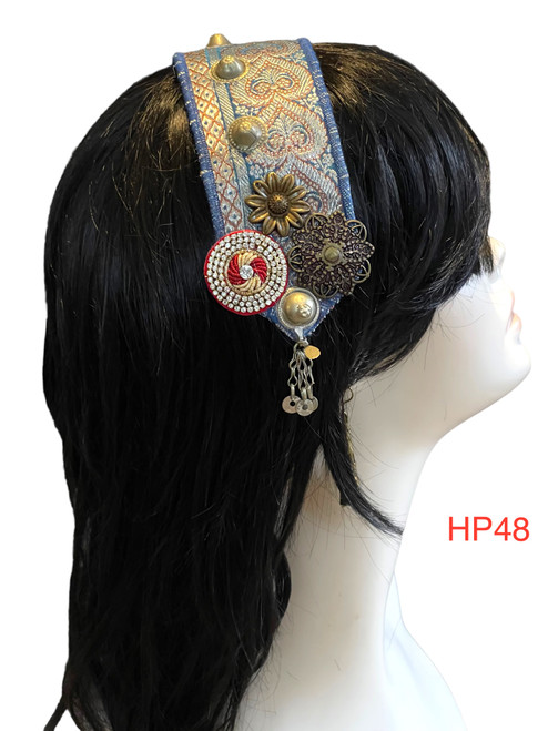 Beautiful Hand made Head piece on a lovely base. It has long ties to secure  it on the head. It is approximately 12" long not including ties.

We can make you a custom head piece in your choice of color and embellishments. Just message us. 

International shipping will be extra. Message us if you are an international customer.
