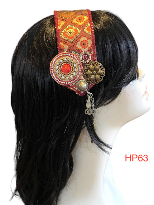 Beautiful Hand made Head piece on a lovely base. It has long ties to secure  it on the head. It is approximately 12" long not including ties.

We can make you a custom head piece in your choice of color and embellishments. Just message us. 

International shipping will be extra. Message us if you are an international customer.
