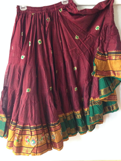 This is a gorgeous 25 Yard Double Bordered Aishwarya Skirt with peacocks embroidered on the hem.

Length 36"

Waist stretches from 28" to 50" 

I can also make you a matching choli or halter in your size.

Layaway is also an option. Please go ahead and put this in your cart and then use the layaway button to check out with details on the items you want to put on layaway. 

I expect a payment every week or 2 weeks. And you have 3 months to pay it off. Please keep these terms in mind while selecting a layaway option.  I expect a 25% or more down or atleast $50 whichever is greater.

Please note that the listing is only for the skirt. Halter or belt not included but available.

Also note that I try to give you the most accurate product. My items are unique and there are times when there are slight variations in borders or slight shade etc. But none the less the item is unique , quality and beautiful. And you will love it!

If is only for the skirt you want custom please email me and I will get you a custom length or waist made for $ 15 extra. 

International S&H extra
