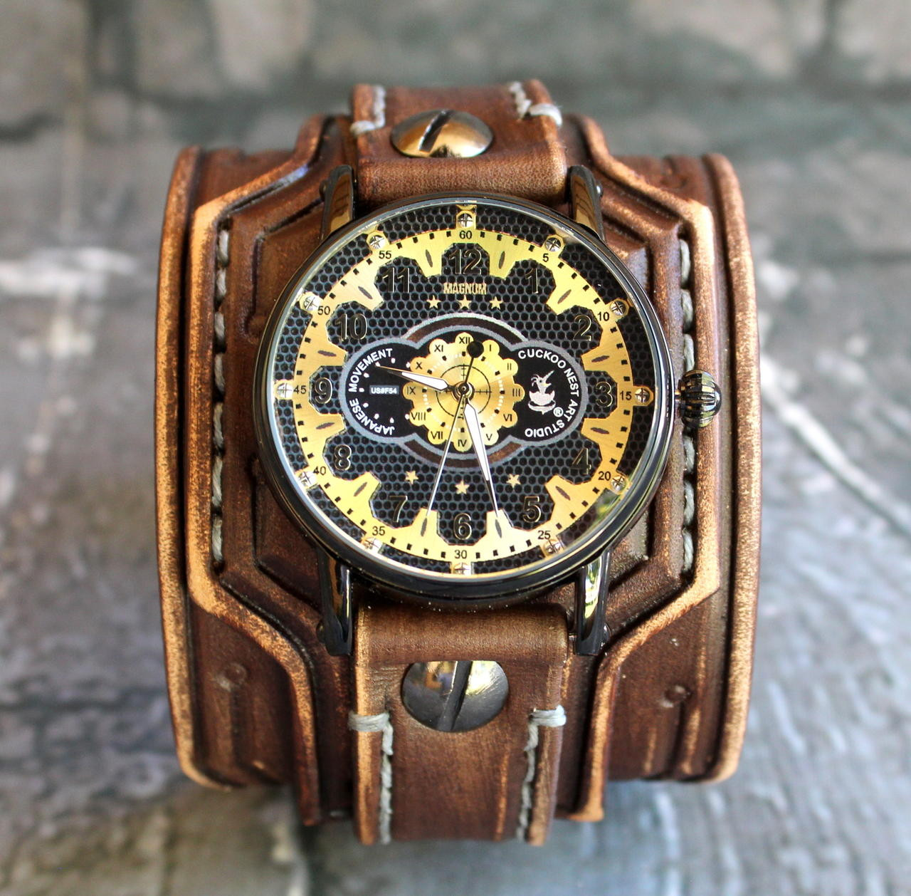 Retro leather watch cuff with steampunk style gold watch