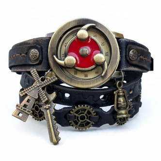 Front view of one-of-a-kind steampunk leather wrap watch featuring a 36mm brass-tone case, red decorative face cover, layered dark leather, gears, and hanging industrial charms.
