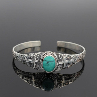 Silver bracelet with turquoise stone and cross