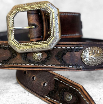 Distressed gray Western belt with bold silver conchos and veg-tan leather
