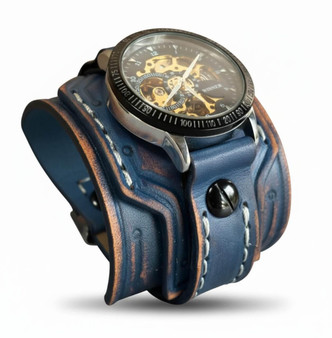Distressed navy leather cuff watch showing thickness and curved fit