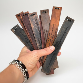 Collection of leather bookmarks in different colors with custom engraving