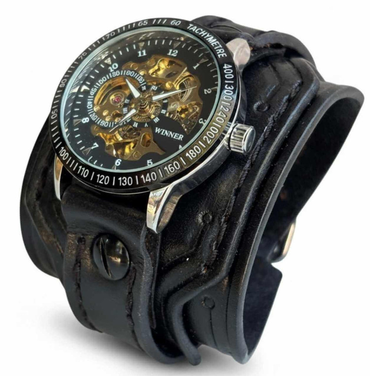 Wide black leather cuff watch for men with mechanical skeleton watch face