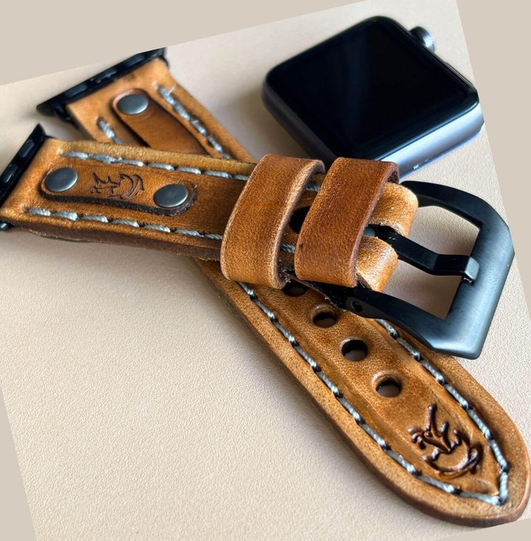 Handmade leather apple watch band in tan color.