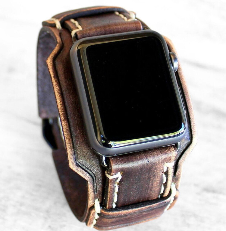 Wide brown leather Apple Watch band with heart-rate cutout, compatible with Series 1–11.