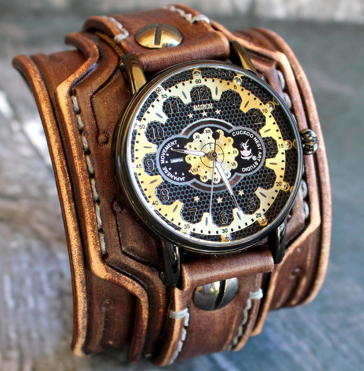 Retro leather watch cuff with steampunk style gold watch
