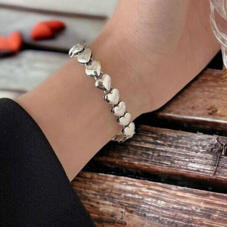 Shine Bright with a Silver Heart Chain Bracelet!