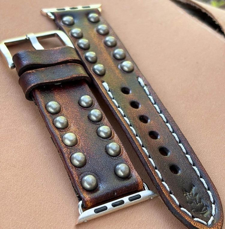 Studded full-grain leather Apple Watch band for men with silver hardware and contrast stitching Studded full-grain leather Apple Watch band for men with silver hardware and contrast stitching