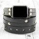 Leather apple watch band in black with silver rivets and double wrap design. Leather apple watch band in black with silver rivets and double wrap design.