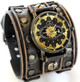 Wide riveted black leather watch cuff with gold watch