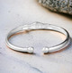 Holding Hands Silver Bangle