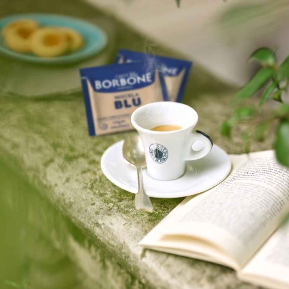 A Lifestyle Photo of Miscela Blu ESE Espresso Pods with an Italian Espresso Cup