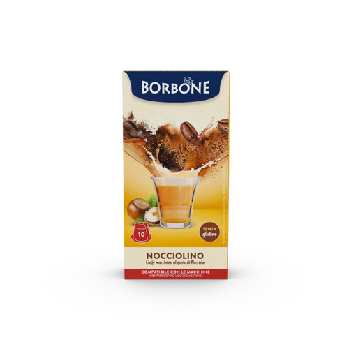 Caffe Borbone's Nocciolino hazelnut-flavored capsules packaging. The box features an image of a creamy hazelnut coffee drink with coffee beans and hazelnuts splashing into the cup. Gluten-free and compatible with Nespresso® Original Line machines.