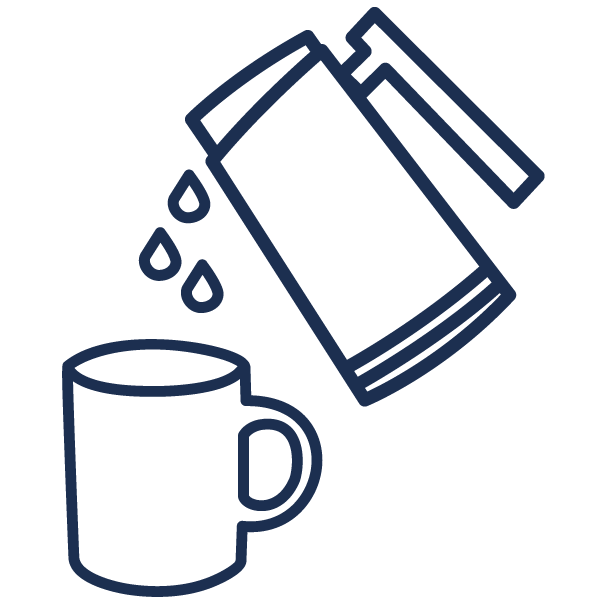coffee being poured from a pot into a mug