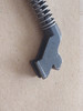 Upclose view of the bottom of the recoil spring.