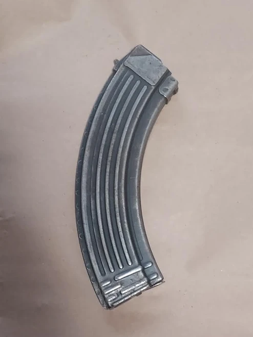 Lightly used Romanian 40 round steel magazine in grade 3 condition.